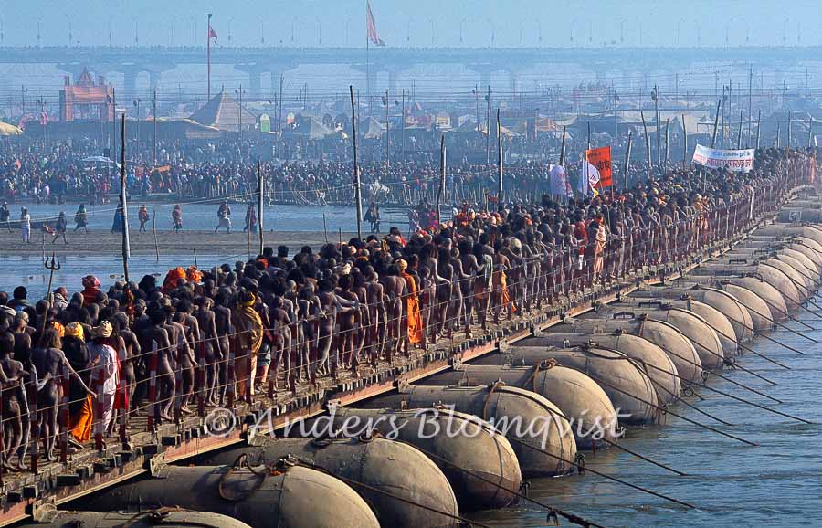  Sadhus crossing a pontoon bridge 