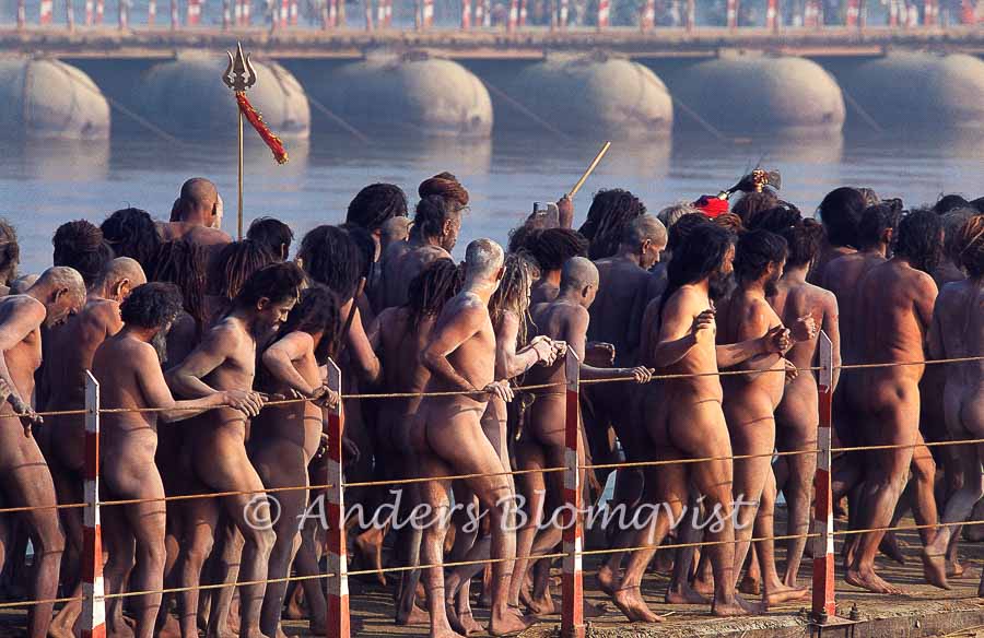  Naked sadhus on a bridge 