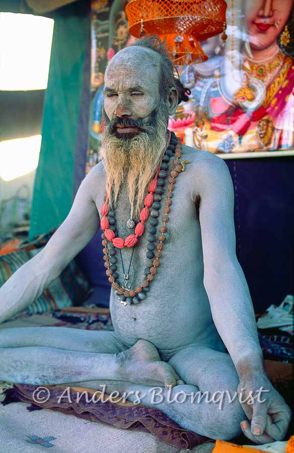  Ash smeared naked sadhu meditating 